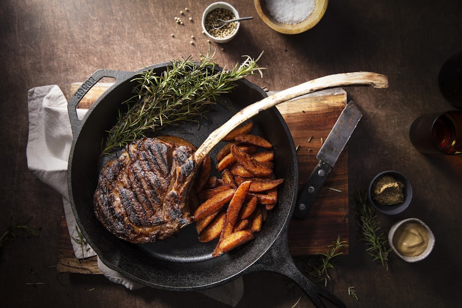 A tomahawk steak resting in a cast-iron skillet