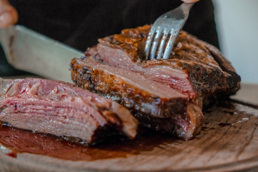 Thick slices of slow-roasted meat on a cutting board
